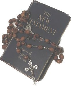 an old-looking new-testament bible with a rosary draped over it